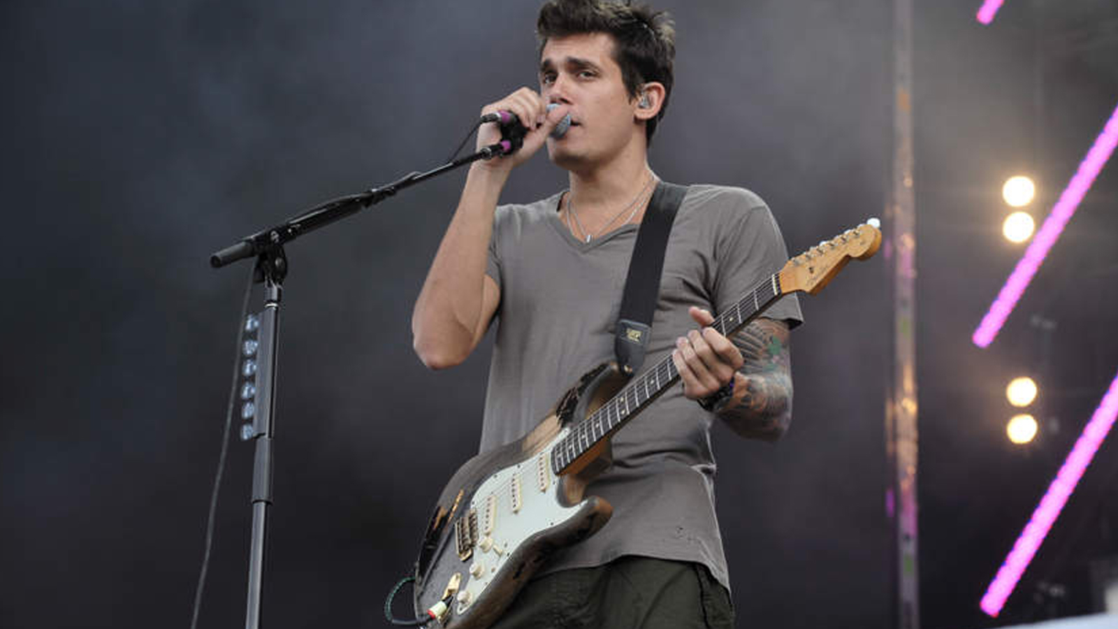 John Mayer on stage with this fender Custom Shop Black1 Strat
