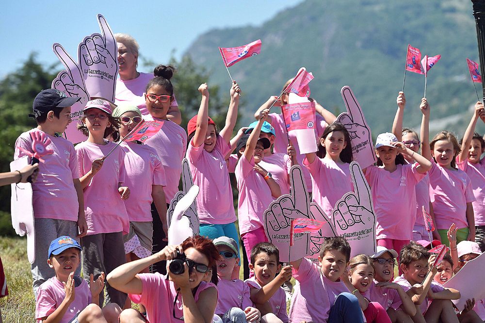 Maglia rosa fans line the streets during stage 19 at the Giro d'Italia