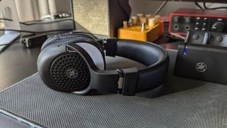 A pair of Yamaha YH-WL500 headphones a desktop