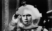 A black-and-white image of a television astronaut in a bubble helmet