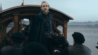 Rhys Ifans looks back with sorrow from an outgoing boat in Anonymous.