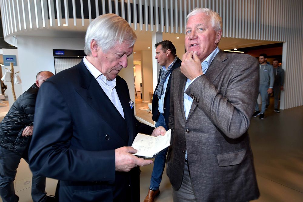 Team general manager Patrick Lefevere chats with Paul de Cock of Quick-Step flooring