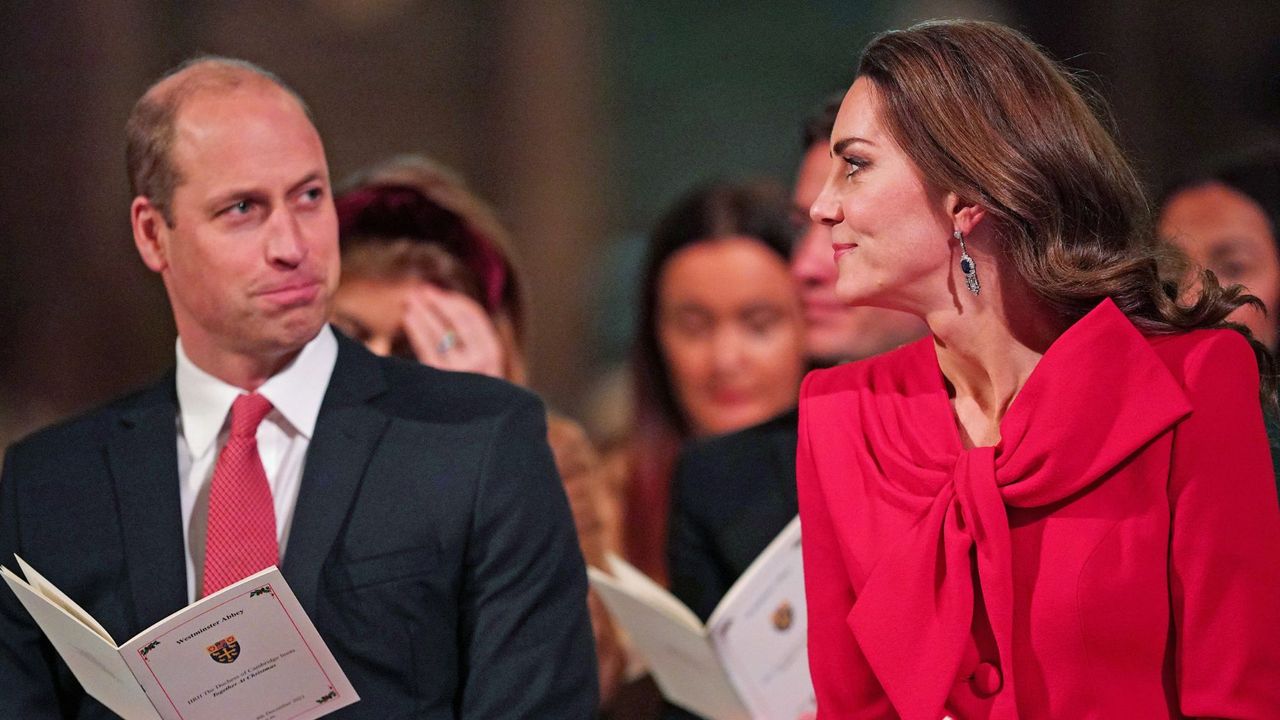 Prince William and Kate Middleton smile at each other during the Royal ’Together at Christmas’ carol service, held at Westminster Abbey, by the now Princess of Wales