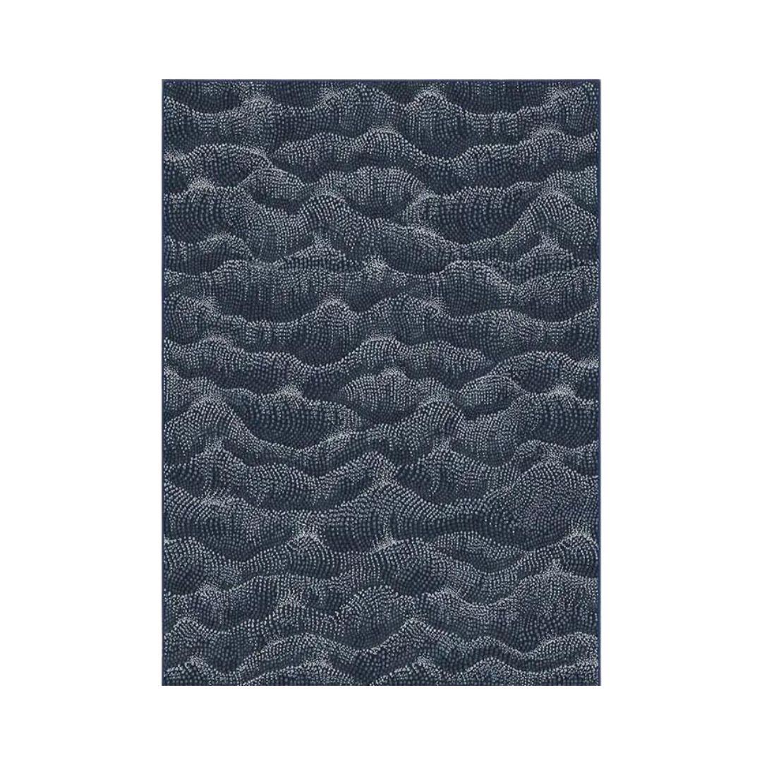 Navy rug with white pattern