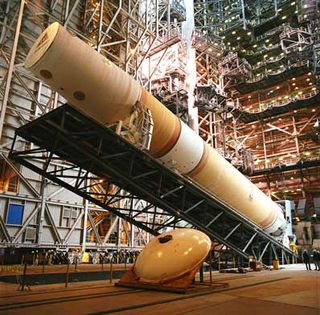 File image of the first Vandenberg Delta 4 rocket being lifted upright at the SLC-6 launch pad.