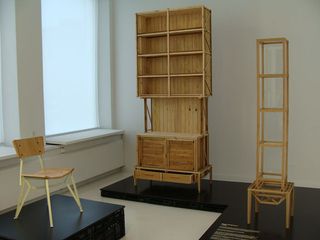 Chair, cabinet and vitrine constructed from wood and steel