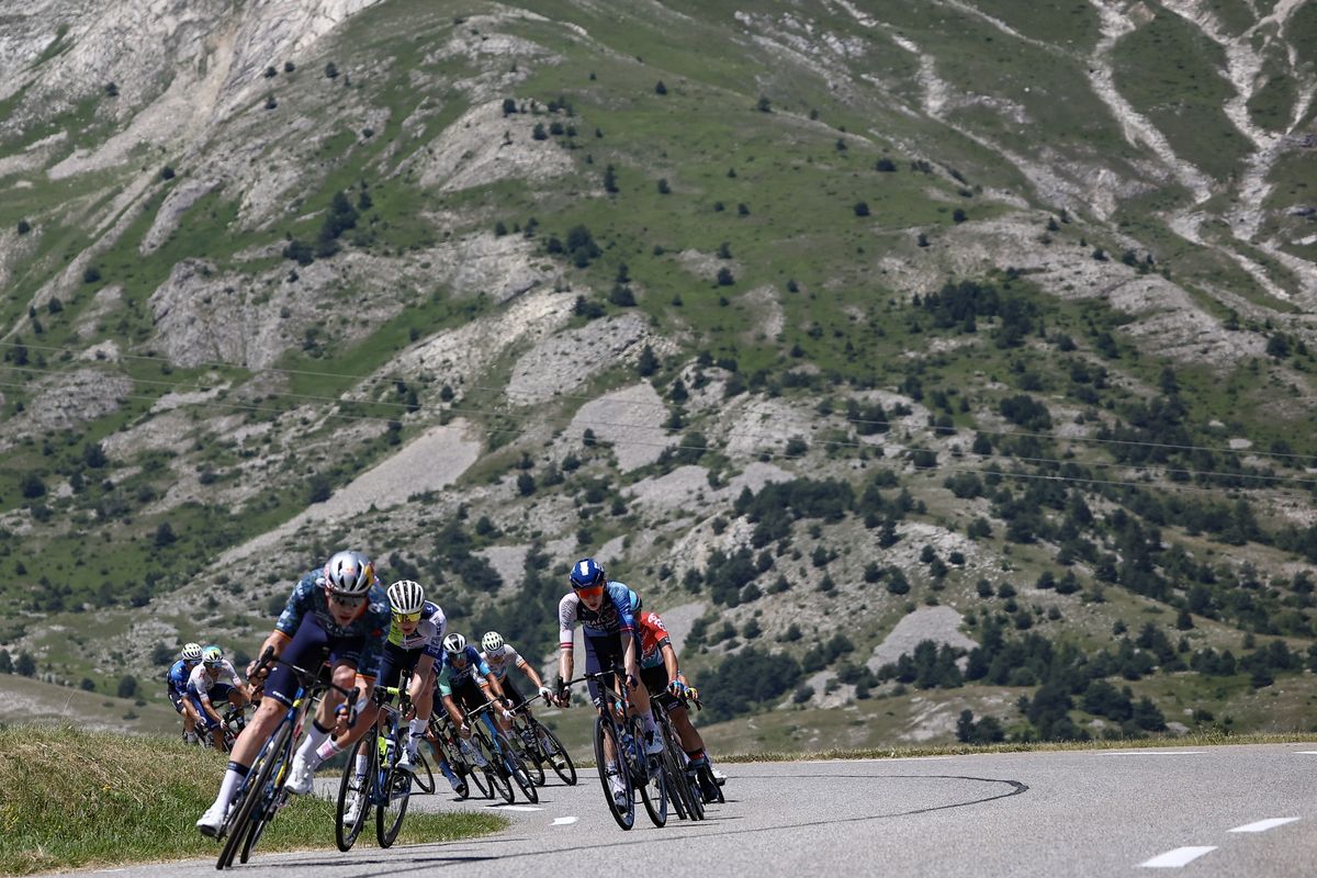 Team Visma - Lease a Bike team's Belgian rider Wout Van Aert, Intermarche - Wanty team's German rider Georg Zimmermann and Israel - Premier Tech team's Latvian rider Krists Neilands lead a breakaway during the 18th stage of the 111th edition of the Tour de France cycling race, 179,5 km between Gap and Barcelonnette, in the French Alps in southeastern France, on July 18, 2024. (Photo by Anne-Christine POUJOULAT / AFP) (Photo by ANNE-CHRISTINE POUJOULAT/AFP via Getty Images)