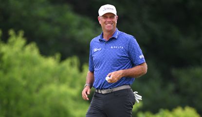 Stewart Cink smiles following his hole-in-one