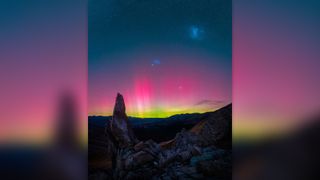 Blue, magenta and green southern lights over Canterbury, New Zealand.