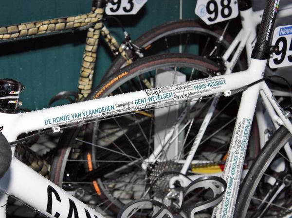 The top tubes of the Omega Pharma-Lotto bikes were treated to a similarly wordy paint job.