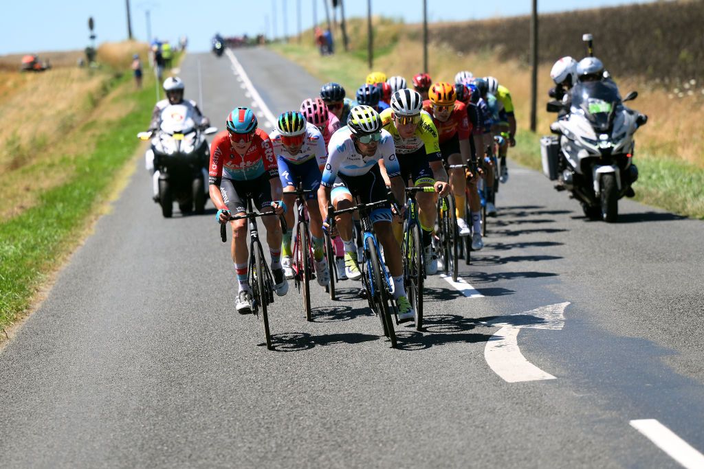 GRAND COLOMBIER FRANCE JULY 14 LR Maxim Van Gils of Belgium and Team Lotto Dstny Nelson Oliveira of Portugal and Movistar Team and Mike Teunissen of The Netherlands and Team IntermarchCircusWanty compete in the breakaway during the stage thirteen of the 110th Tour de France 2023 a 1378km stage from ChtillonSurChalaronne to Grand Colombier 1501m UCIWT on July 14 2023 in Grand Colombier France Photo by David RamosGetty Images