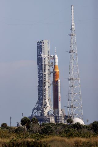 A NASA rocket ship prepares to take off.