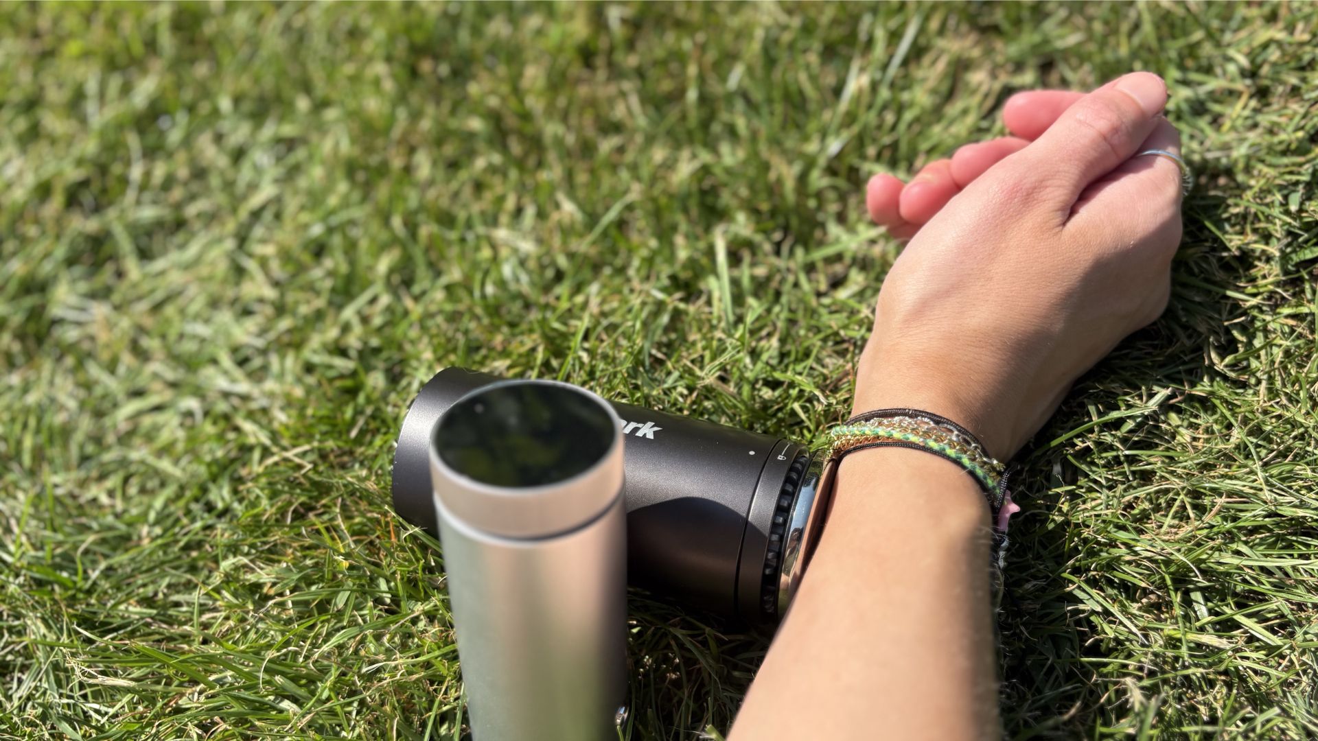 Shark ChillPill 3-in-1 Fan, Mist &amp;amp; InstaChill System being tested outside with the cold plate on an arm