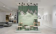 Shop with lights, chairs & side tables on display