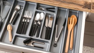 cutlery organised in a drawer
