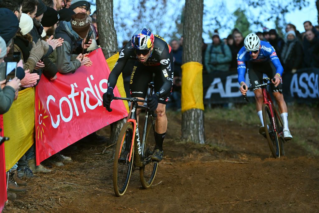 ZOLDER BELGIUM DECEMBER 27 Mathieu Van Der Poel of The Netherlands and Team AlpecinDeceuninck and Wout Van Aert of Belgium and Team JumboVisma lead the breakaway during the 18th Superprestige HeusdenZolder 2022 Mens Elite Superprestige2023 on December 27 2022 in Zolder Belgium Photo by Luc ClaessenGetty Images