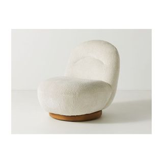 white velor swivel chair