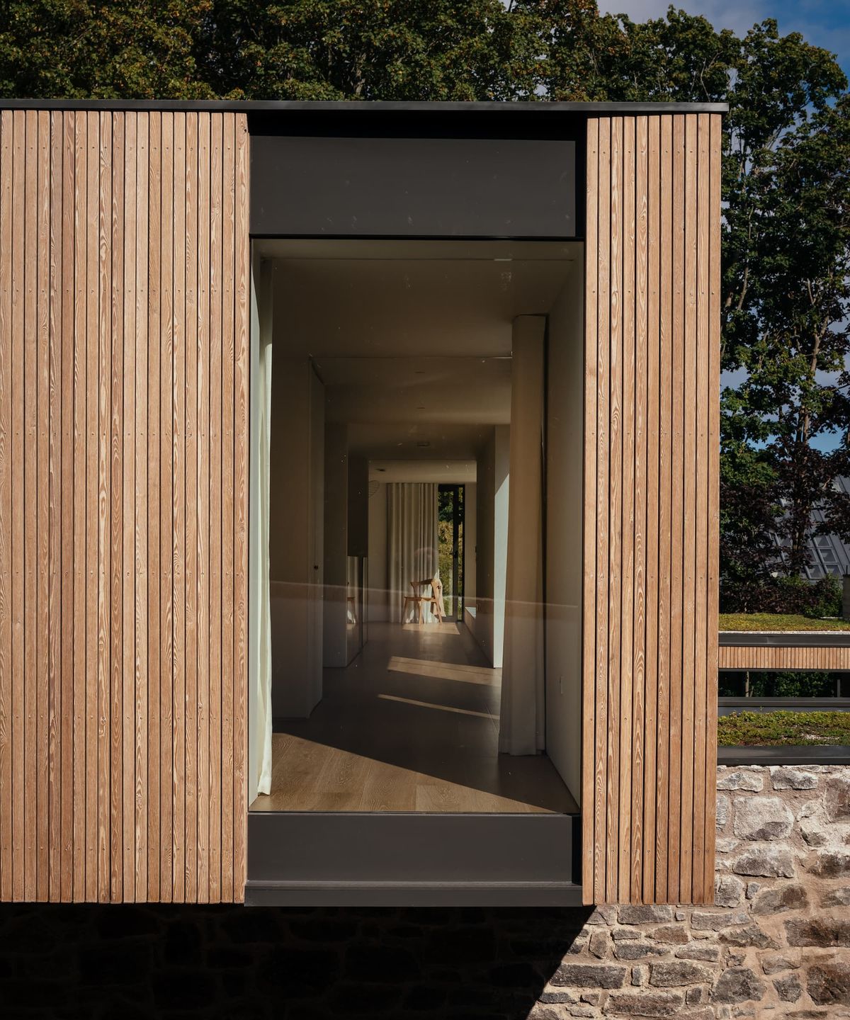 Timber cladding on the outside on the upstairs of a house