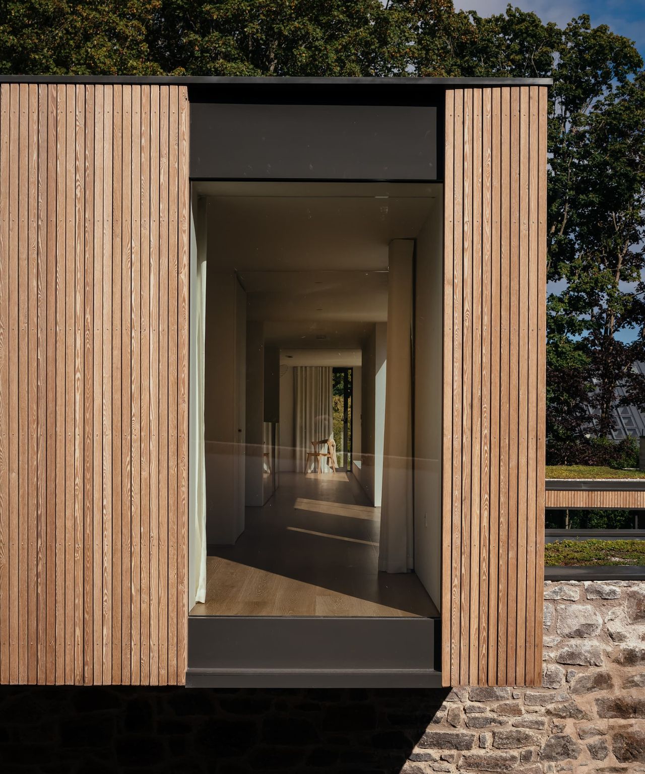 Timber cladding on the outside on the upstairs of a house