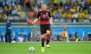 Bastian Schweinsteiger playing for Germany against Brazil in the 2014 World Cup semi-finals