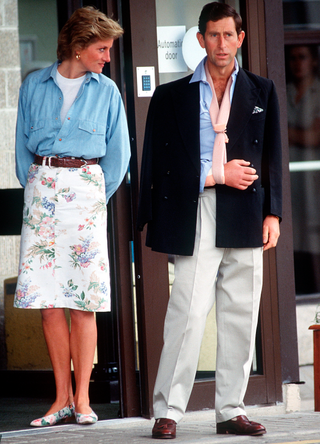 Prince Charles With Princess Diana (on Her Birthday 1st July) Leaving Cirencester Hospital With His Arm Bandaged And In A Sling in 1990