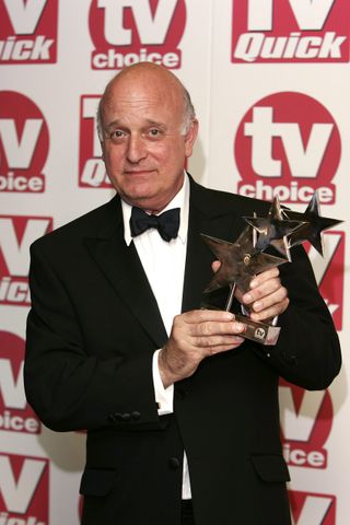 LONDON - SEPTEMBER 5: Actor Gary Waldhorn poses with the award for 'Best Comedy Show' for "The Vicar of Dibley" at the TV Quick and TV Choice Awards at the Dorchester Hotel, Park Lane on September 5, 2005 in London, England. (Photo by MJ Kim/Getty Images)