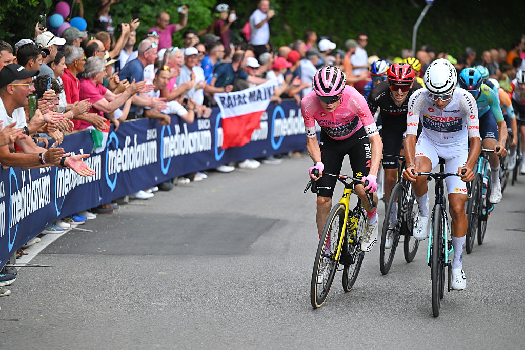 PIEVE DI SOLIGO, ITALY - MAY 28: (L-R) Jonas Vingegaard of Denmark and Team Visma | Lease a Bike - Pink Leader Jersey and Afonso Eulalio of Portugal and Team Bahrain - Victorious - White Best Young Rider Jersey compete climbing the Muro di Ca&amp;apos; del Poggio (241m) during the 109th Giro d&amp;apos;Italia 2026, Stage 18 a 171km stage from Fai della Paganella to Pieve di Soligo / #UCIWT / on May 28, 2026 in Pieve di Soligo, Italy. (Photo by Tim de Waele/Getty Images)