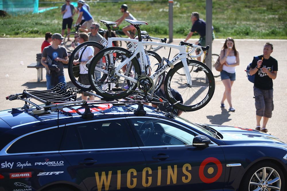 Fans outside the velodrome inspect the Wiggins team car.