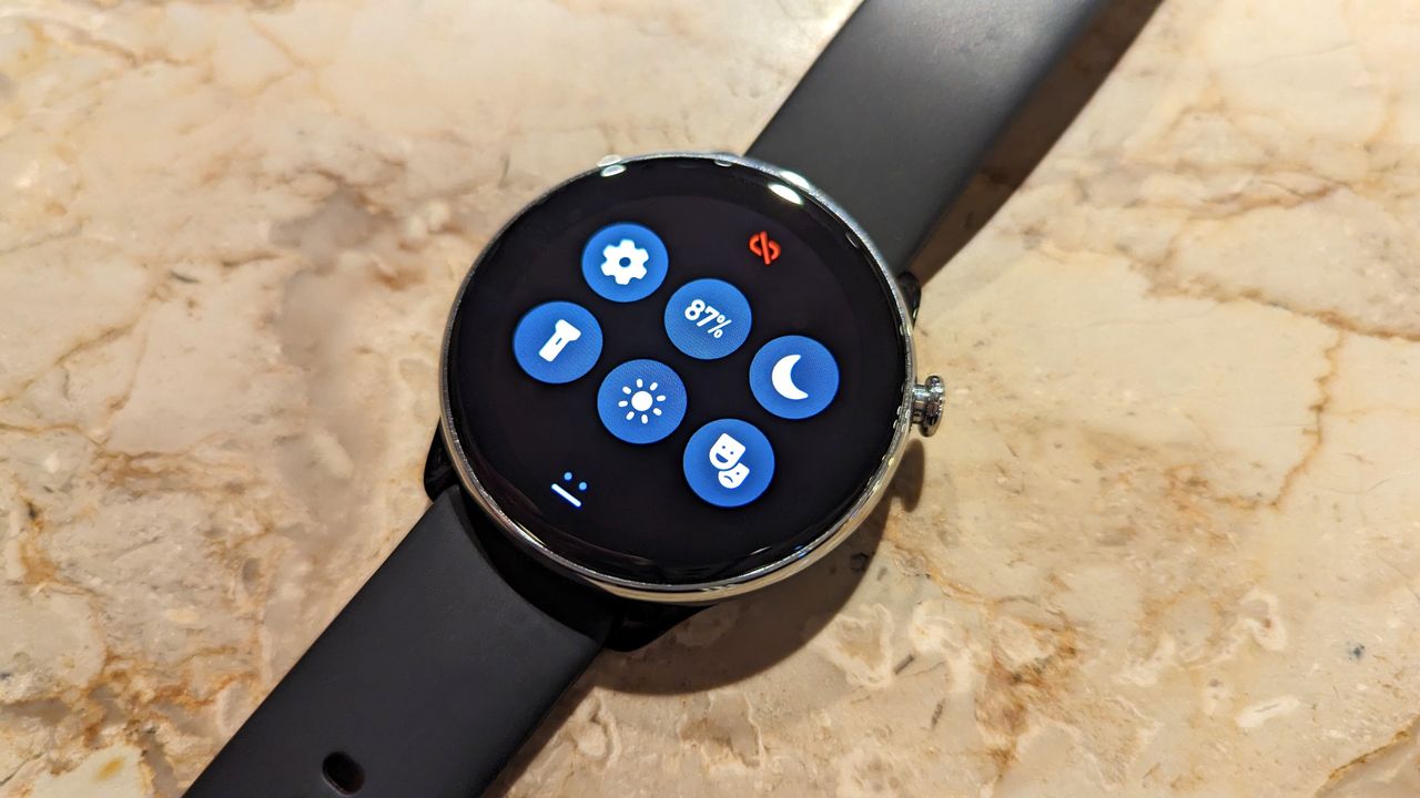 Amazfit GTR Mini smartwatch kept on a marble table.