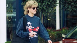 LONDON - NOVEMBER 01: Princess Diana, Princess of Wales, wearing Virgin Atlantic sweatshirt and shorts, leaves Chelsea Harbour Club, London on November 01, 1995 in London, England