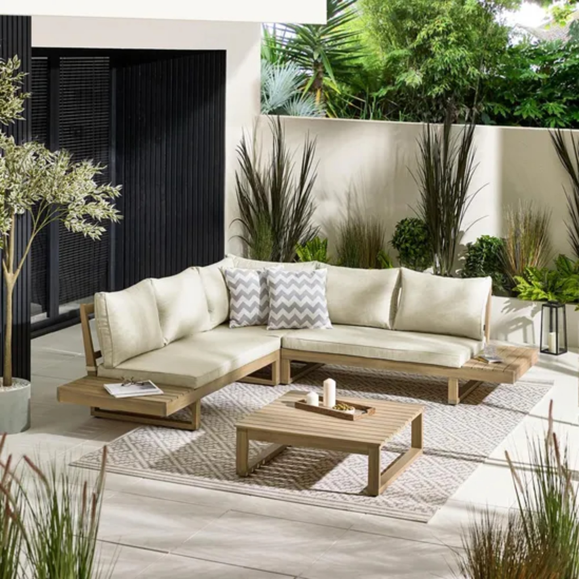 Furniturebox Brisa Solid Wood 5 Seat Outdoor Sofa Set on a patio