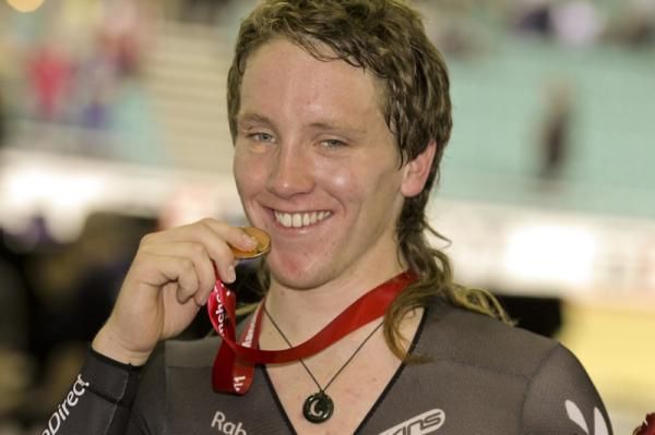 A delighted Shane Archbold (NZL) with the gold medal he won in the men's omnium.