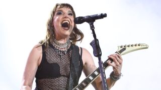 Lzzy Hale of Halestorm onstage in 2025