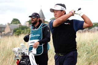 KJ Choi hits a tee shot and watches its flight