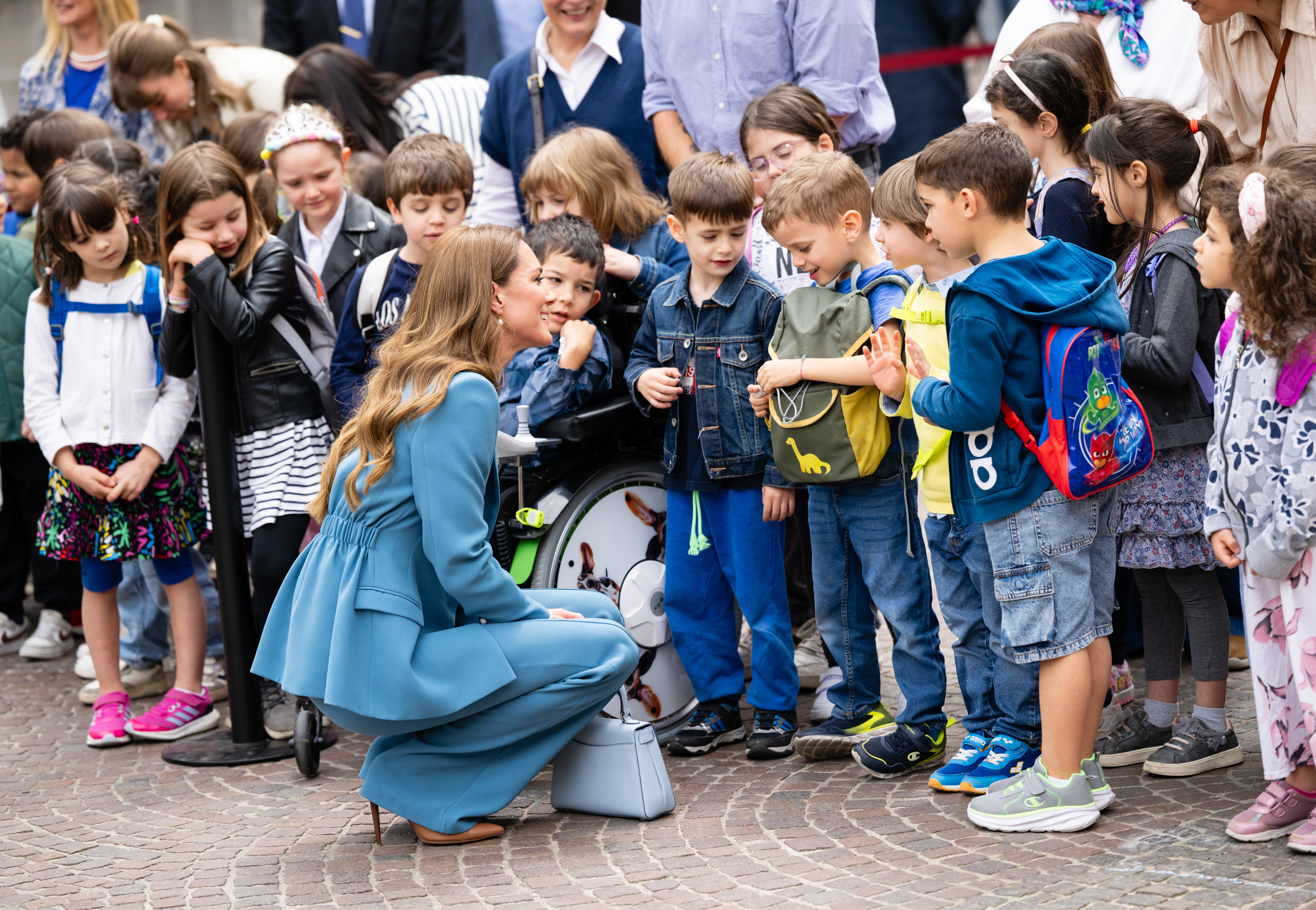 Kate Middleton carries a new powder blue Asprey bag during her visit to Italy