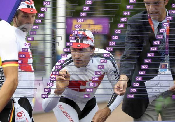 Fabian Cancellara (Switzerland) signs on for the start.