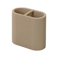 Studio 3B Fluted Toothbrush Holder for $12, at Bed Bath &amp; Beyond