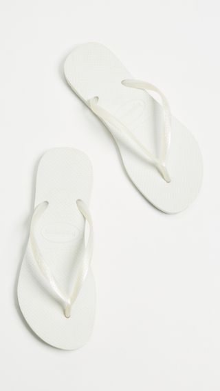 white rubber flip flops for women