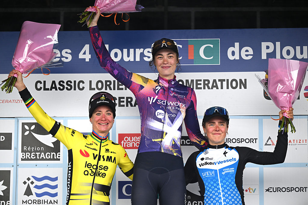 PLOUAY, FRANCE - AUGUST 30: (L-R) Marianne Vos of Netherlands and Team Visma | Lease a Bike on second place, race winner Mischa Bredewold of Netherlands and Team SD Worx - Protime, Eline Jansen of Netherlands and Team VolkerWessels Cycling on third place and Cedrine Kerbaol of France and Team EF Education-Oatly pose on the podium ceremony after the 24th GP de Plouay - Lorient- Agglomeration Trophee 2025 a 165.3km one day race from Plouay to Plouay / #UCIWWT / on August 30, 2025 in Plouay, France. (Photo by Luc Claessen/Getty Images)