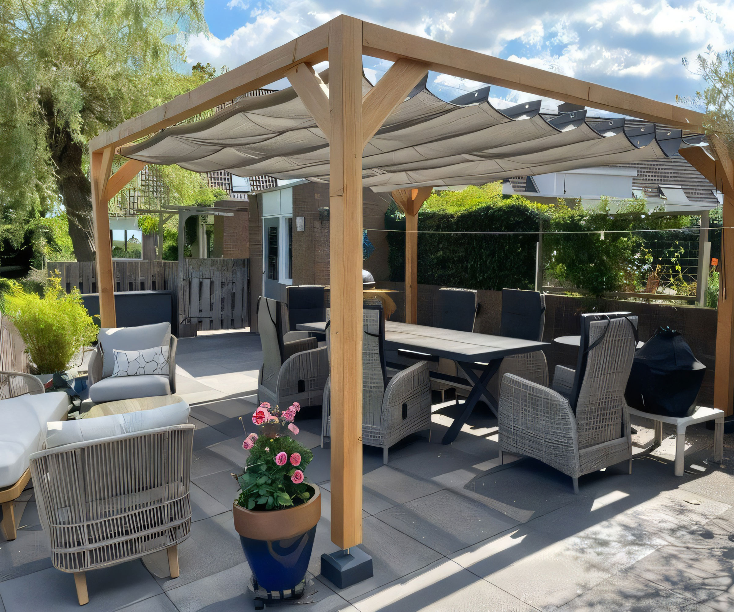 outdoor dining area with pergola and awning