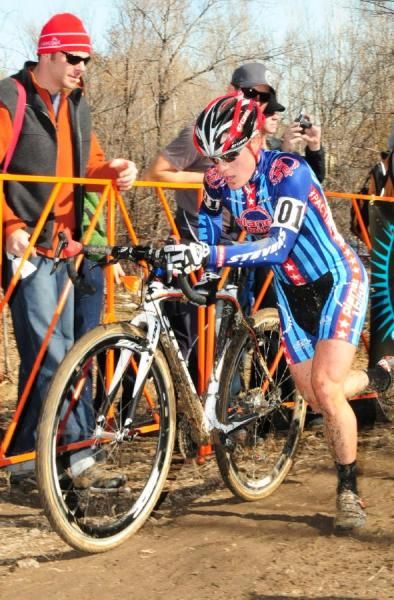 Katie Compton (Planet Bike) running the steps with a big lead