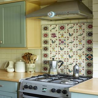 Kitchen with patterned wall tiles
