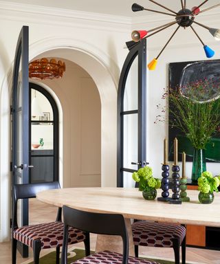 Studio Vero dining room design with curved doorway