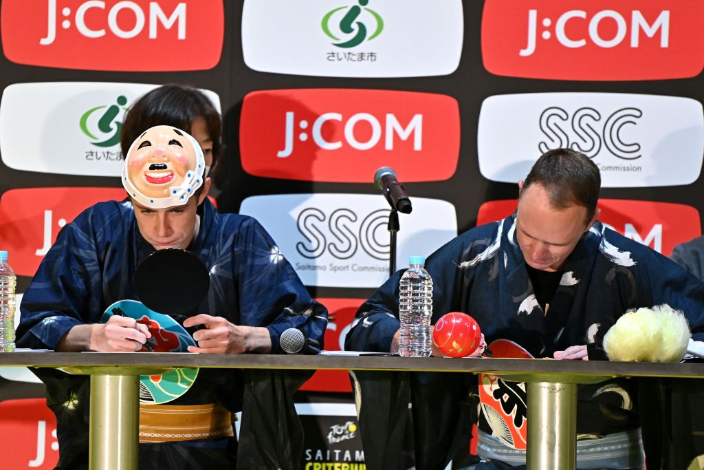 SAITAMA JAPAN NOVEMBER 05 LR Jonas Vingegaard Rasmussen of Denmark and Team Jumbo Visma Yellow Leader Jersey and Christopher Froome of United Kingdom and Team Israel Premier Tech participate in a Drawing Test Quiz Contest at Thematic Japanese Festival during the 8th Tour de France Saitama Criterium 2022 Media Day SaitamaCriterium on November 05 2022 in Saitama Japan Photo by Kenta HaradaGetty Images