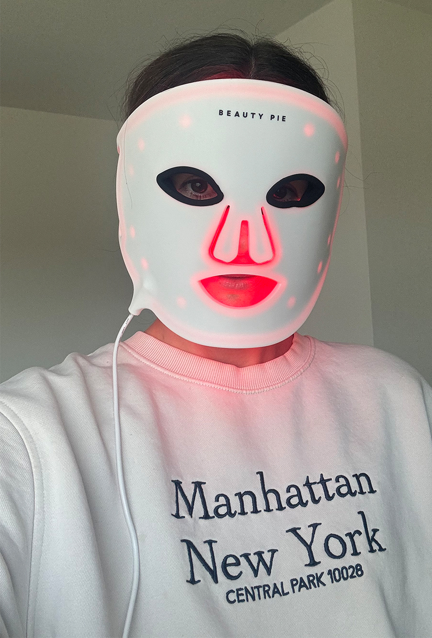 Beauty editor Eleanor Vousden wearing Beauty Pie LED mask