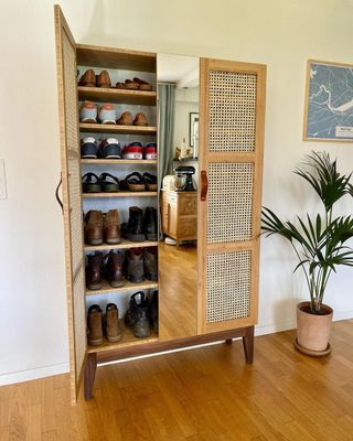 Rattan shoe closet with door open