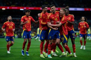 Rodri of Spain celebrates after scoring the team's first goal with Lamine Yamal of Spain, Alvaro Morata of Spain, Dani Olmo of Spain and Nico Williams of Spain during the International Friendly match between Spain and Brazil at Estadio Santiago Bernabeu on March 26, 2024 in Madrid, Spain.