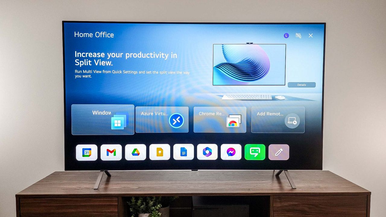LG B4 OLED TV on table in living room