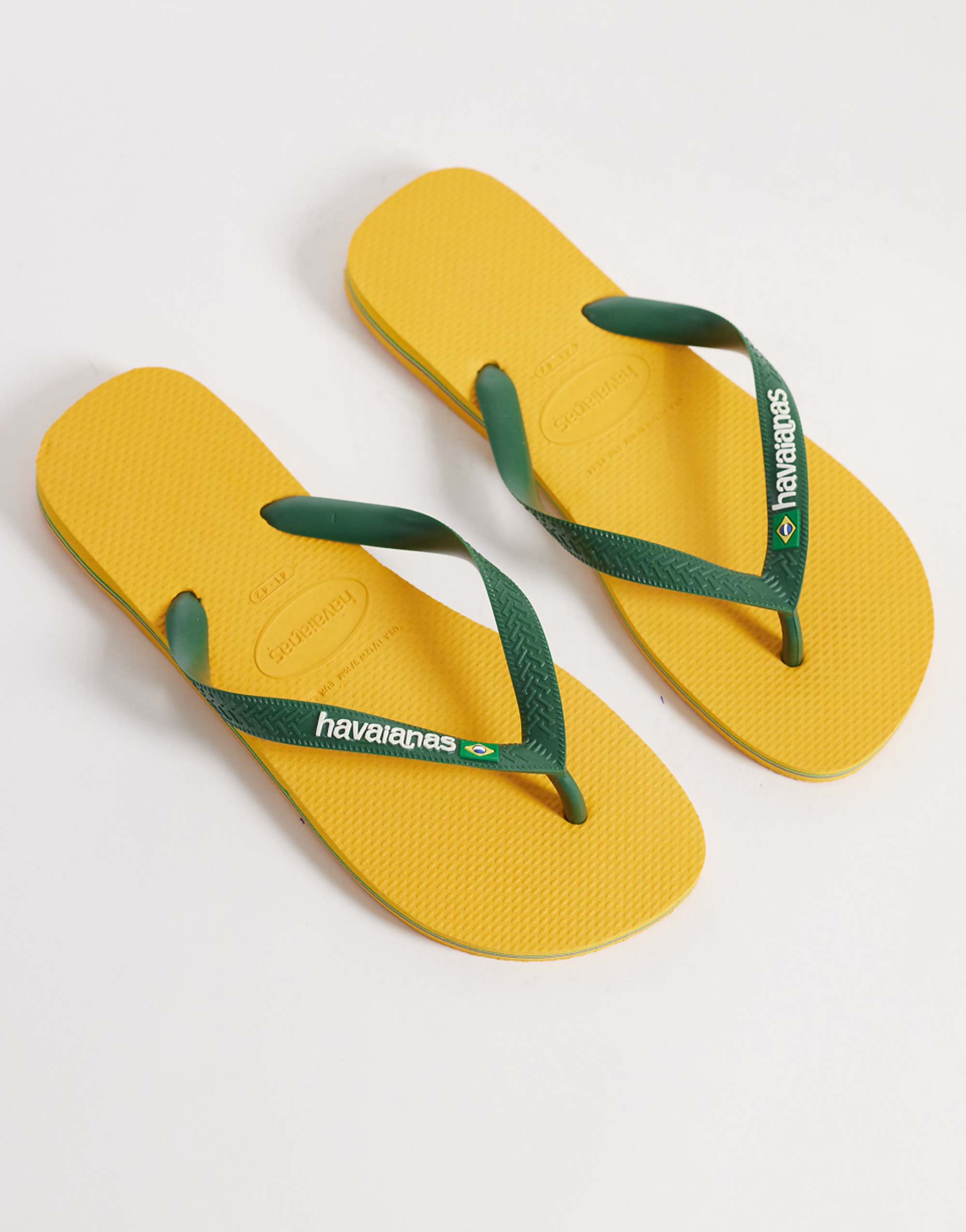 Havaianas Unisex Brazil Logo Flip Flops in Yellow