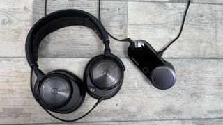SteelSeries Arctis Nova Pro on a wooden surface